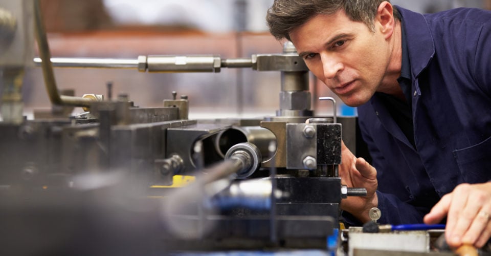 Engineer Looking at Machine