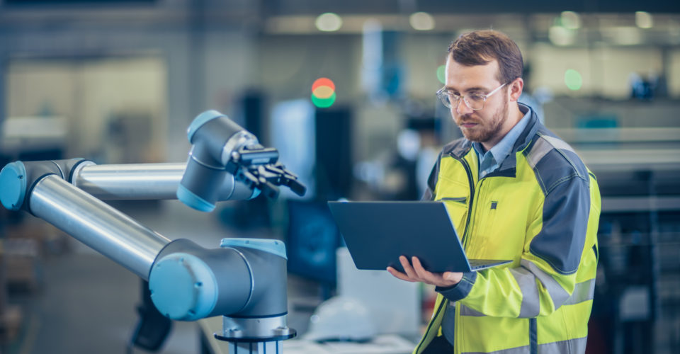 Health and safety man in hi-vis jacket with an ipad