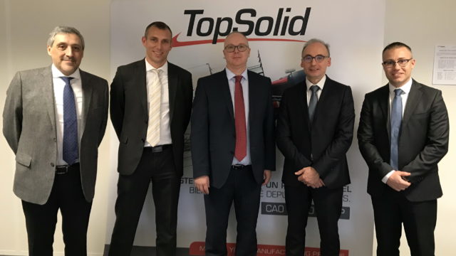 top solid staff in-front of top solid banner